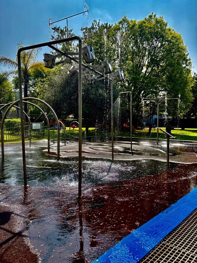 Water arches and fountains across the splash pad at The Play Date water park